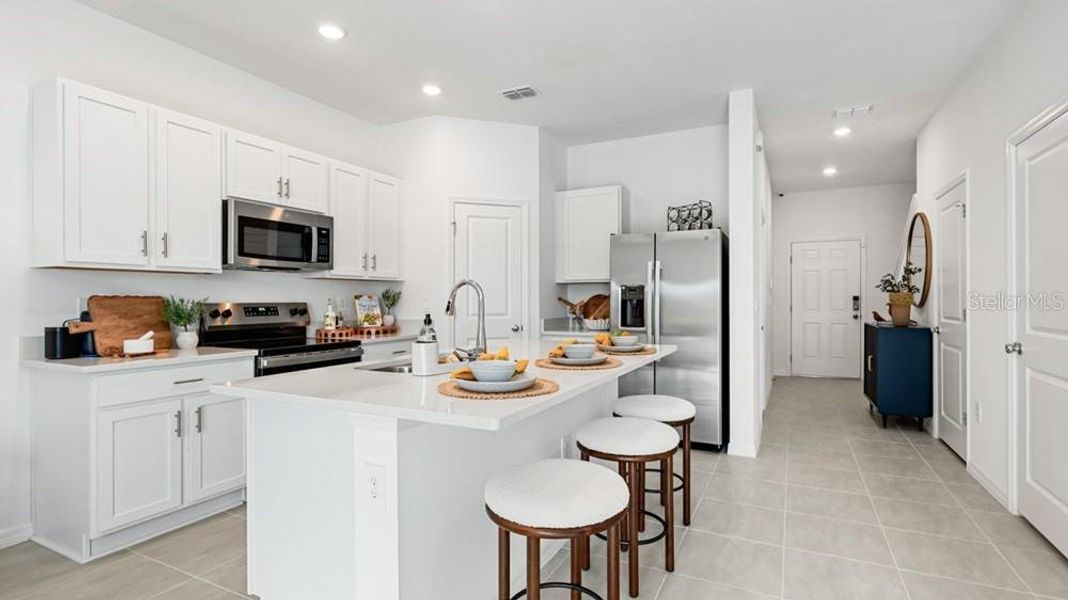 Furnished interior view inside a new home in Skye Ranch Community Group Page, Sarasota (Image 7).