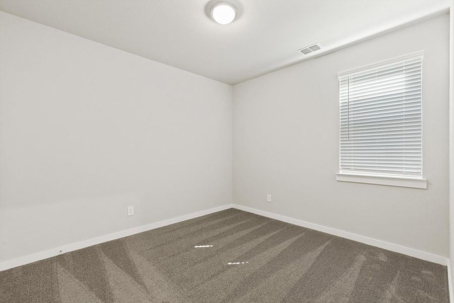 Spacious, unfurnished interior of a new home in Trinity Ranch, Elgin (Image 18).