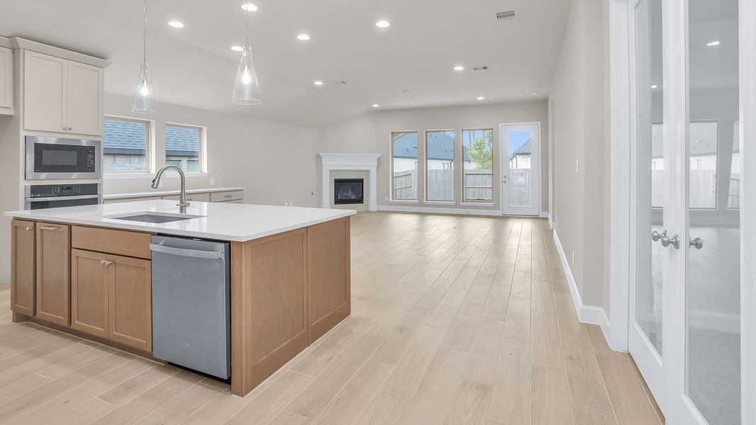 Furnished interior view inside a new home in Woodhavyn, Magnolia (Image 10).