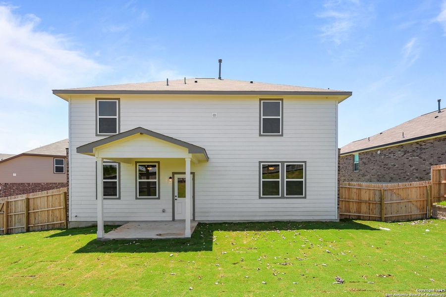 Front exterior of a new home in Comanche Ridge, San Antonio, TX, highlighting curb appeal (Image 49). Front exterior of a new home in Comanche Ridge, San Antonio, TX, highlighting curb appeal (Image 49).