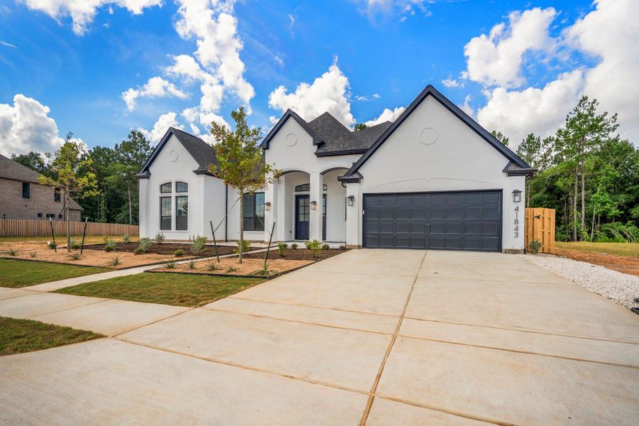 Front exterior of a new home in Colton, Todd Mission, TX, highlighting curb appeal (Image 25). Front exterior of a new home in Colton, Todd Mission, TX, highlighting curb appeal (Image 25).