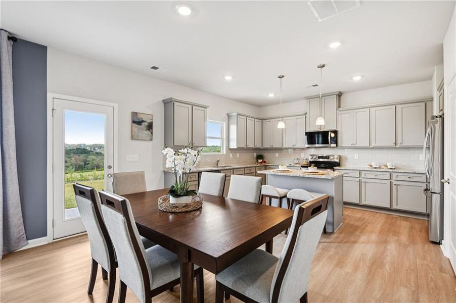 Furnished interior view inside a new home in The Hills at Cedar Creek, Winder (Image 13).