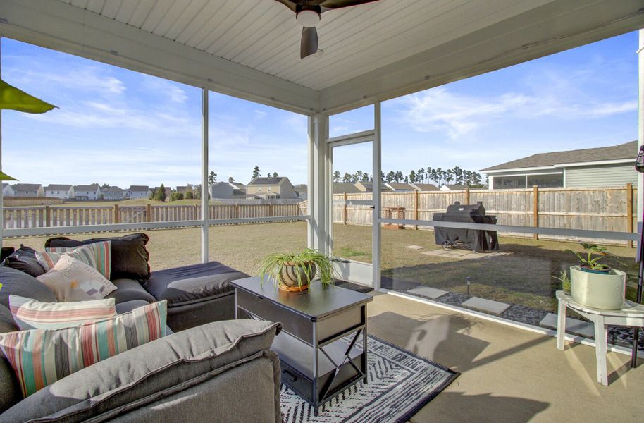 Exterior details and patio area of a home in Sanctuary Cove at Cane Bay, Summerville (Image 30).