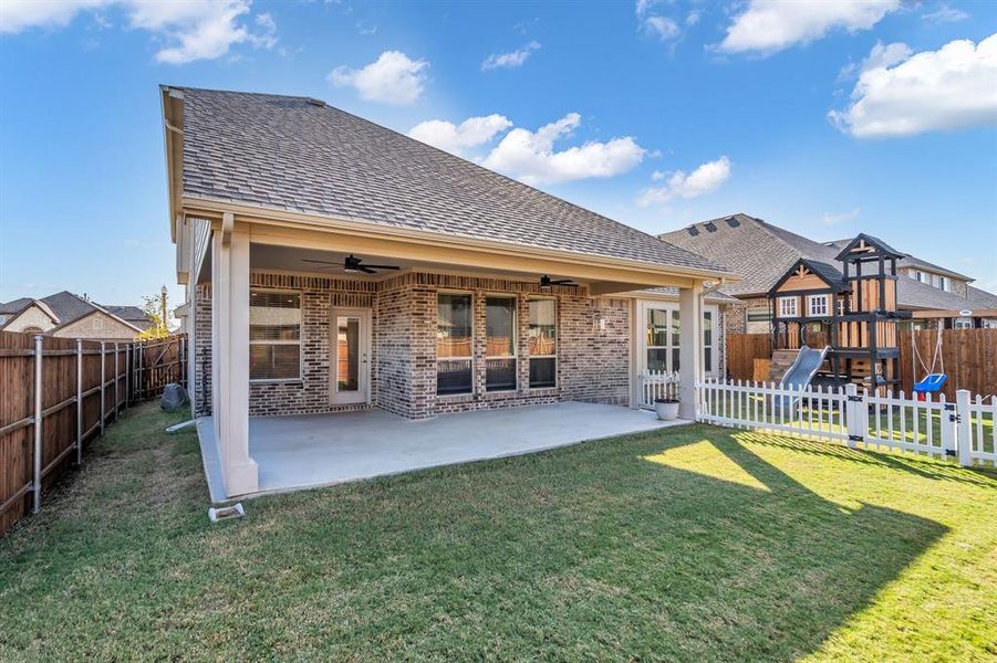 Exterior details and patio area of a home in Country Lakes Classic 50, Denton (Image 21). Exterior details and patio area of a home in Country Lakes Classic 50, Denton (Image 21).