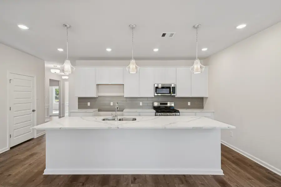 The Crawford- Kitchen. Home under construction, sample photo used for illustrative purposes only, colors and options will vary.