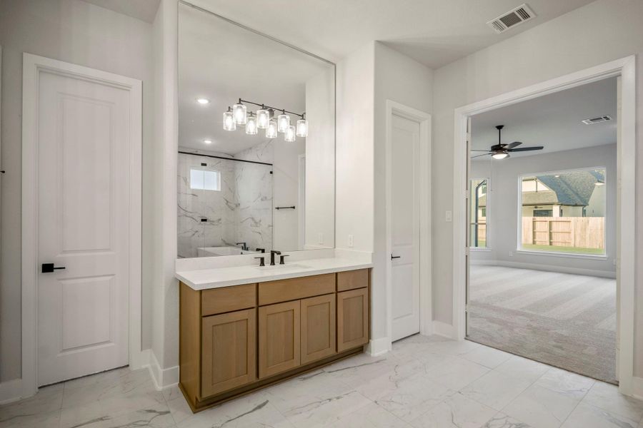 Furnished interior view inside a new home in ARTAVIA 70′ Lots, Conroe (Image 13).