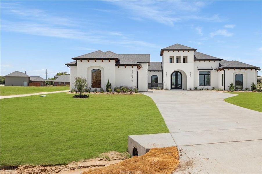 Front exterior of a new home in , Bryan, TX, highlighting curb appeal (Image 23).