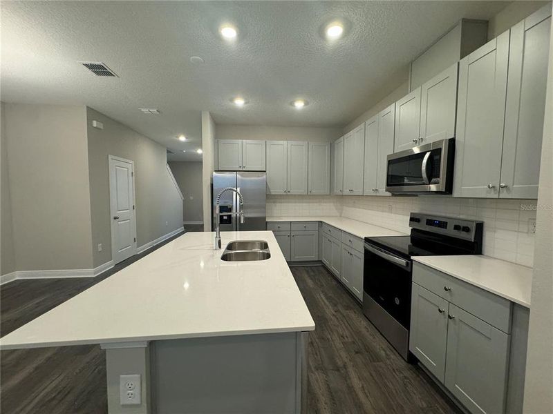 Furnished interior view inside a new home in , Winter Garden (Image 7).