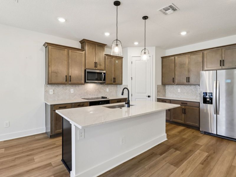 Furnished interior view inside a new home in Ridgehaven - Signature Series, Ormond Beach (Image 3).