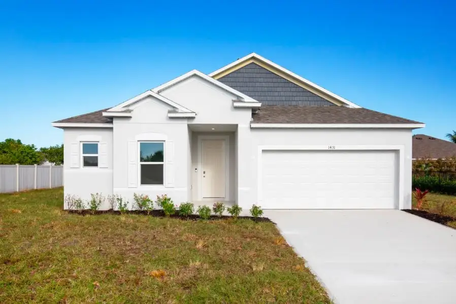 Front exterior of a new home in Cape Coral, Cape Coral, FL, highlighting curb appeal (Image 1). Front exterior of a new home in Cape Coral, Cape Coral, FL, highlighting curb appeal (Image 1).