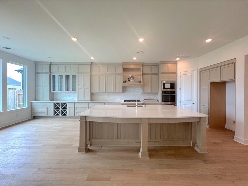 Upgraded farmhouse kitchen with two toned cabinets