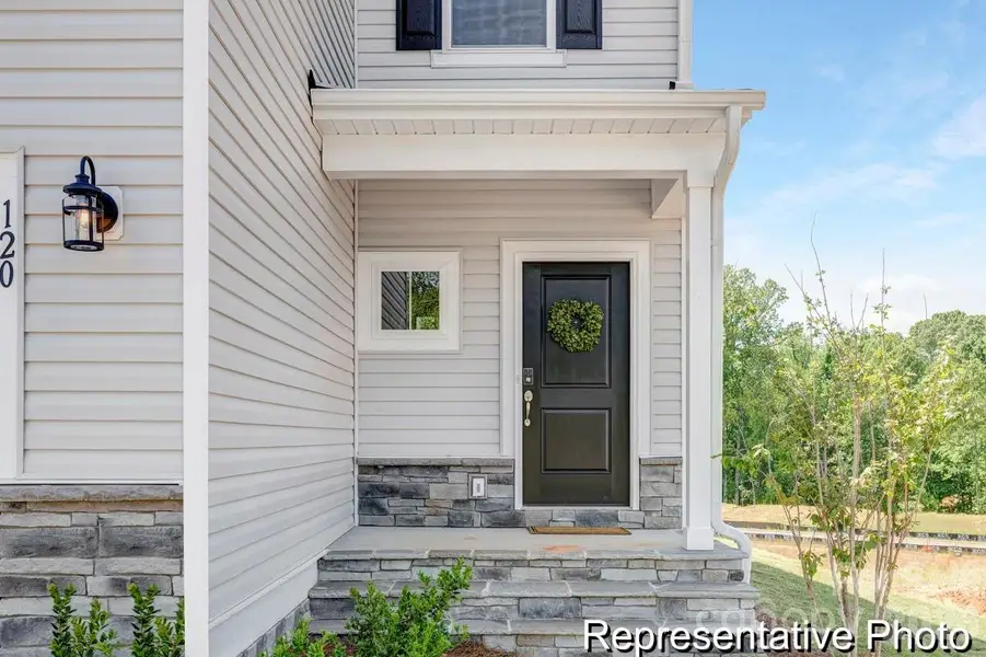 Exterior details and patio area of a home in Morgan Hills, Albemarle (Image 3). Exterior details and patio area of a home in Morgan Hills, Albemarle (Image 3).