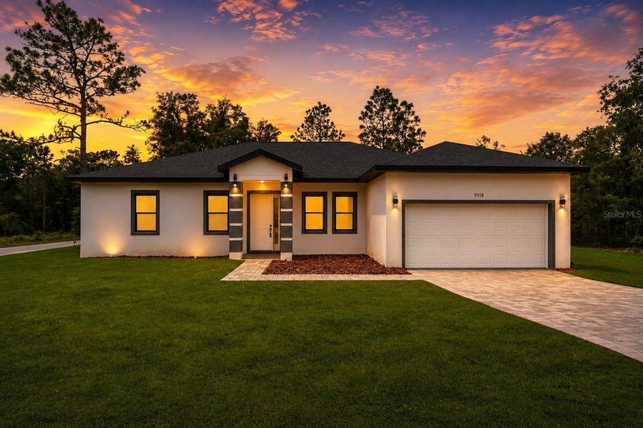 Front exterior of a new home in , Citrus Springs, FL, highlighting curb appeal (Image 21).