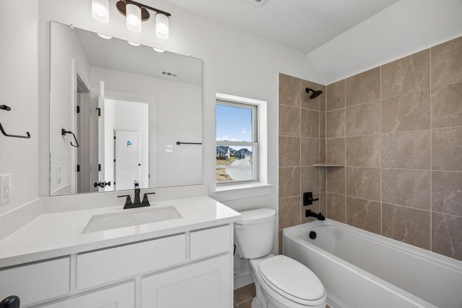 Furnished interior view inside a new home in Dominion of Pleasant Valley, Wylie (Image 12).