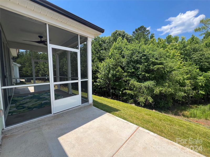 Right side patio pad off screened porch.