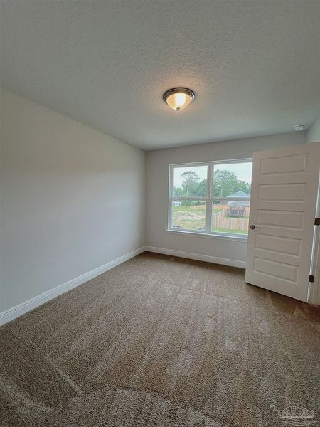 Spacious, unfurnished interior of a new home in Pine Top, Cantonment (Image 12).