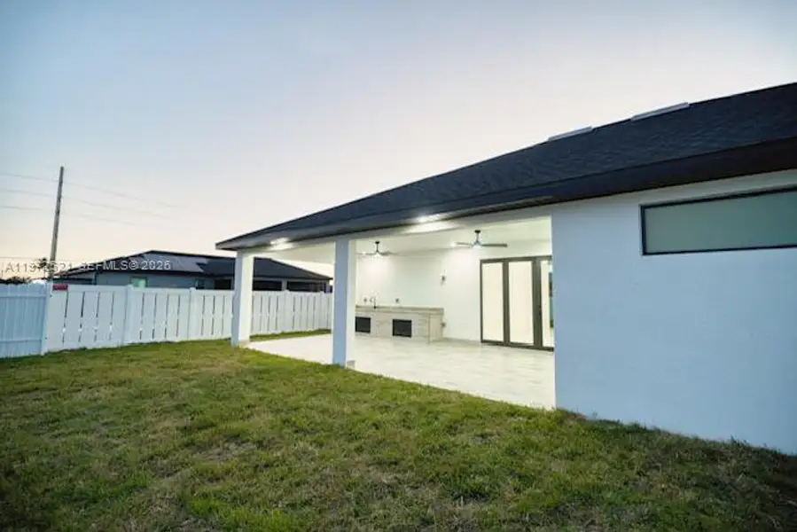 Exterior details and patio area of a home in , Cape Coral (Image 17).