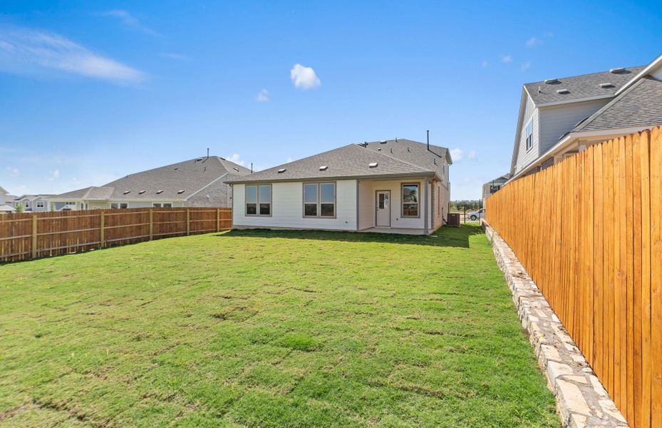 Exterior details and patio area of a home in Saddleback at Santa Rita Ranch, Liberty Hill (Image 21). Exterior details and patio area of a home in Saddleback at Santa Rita Ranch, Liberty Hill (Image 21).