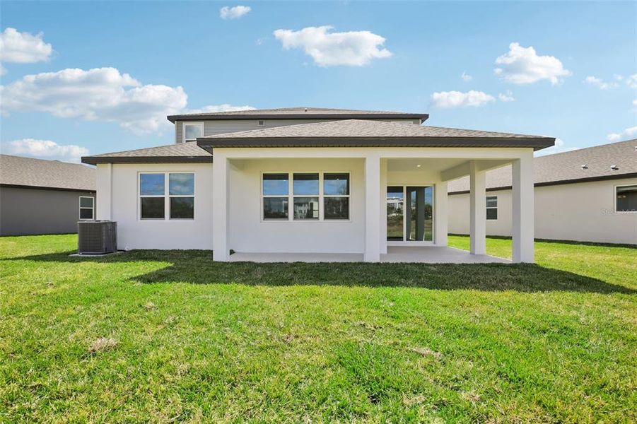 Exterior details and patio area of a home in Magnolia Bay - Reserve Series, Nokomis (Image 3).