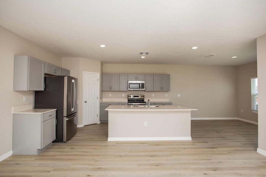 Furnished interior view inside a new home in Villa Mar, Winter Haven (Image 6).