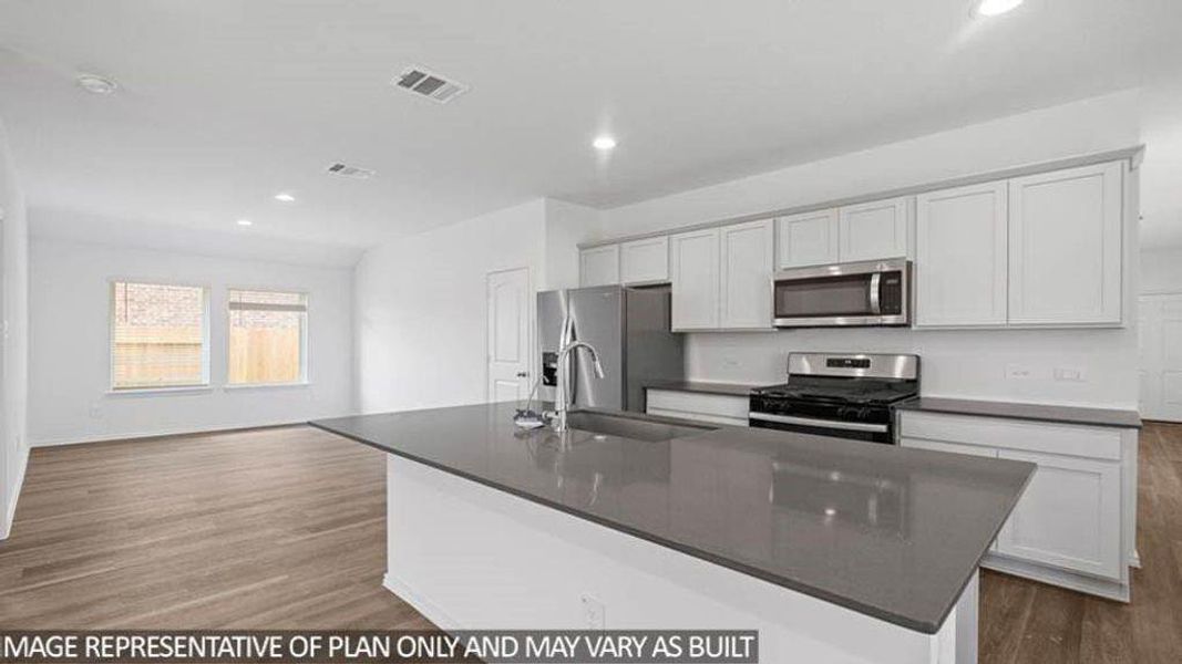 Furnished interior view inside a new home in Sunterra, Katy (Image 4).