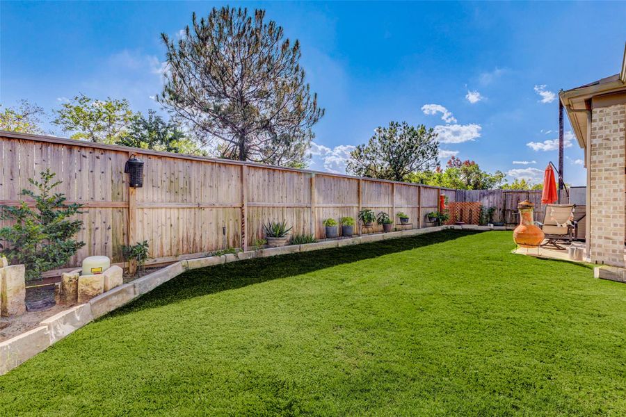 Exterior details and patio area of a home in Cross Creek West 55', Fulshear (Image 23).