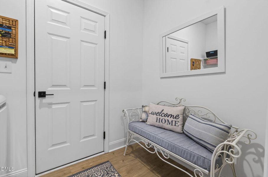 Laundry room with sitting area