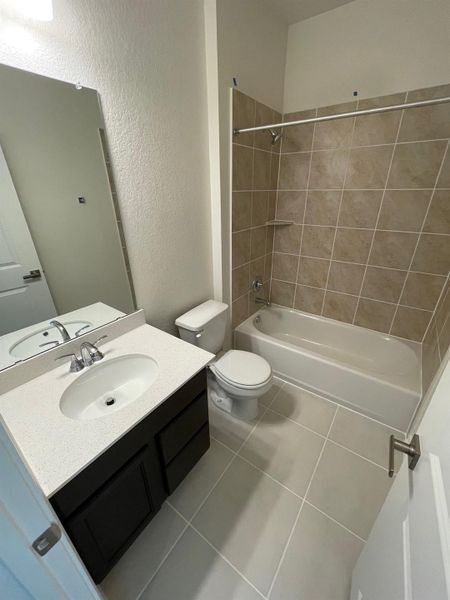 Furnished interior view inside a new home in Mustang Valley, Manor (Image 7). Furnished interior view inside a new home in Mustang Valley, Manor (Image 7).