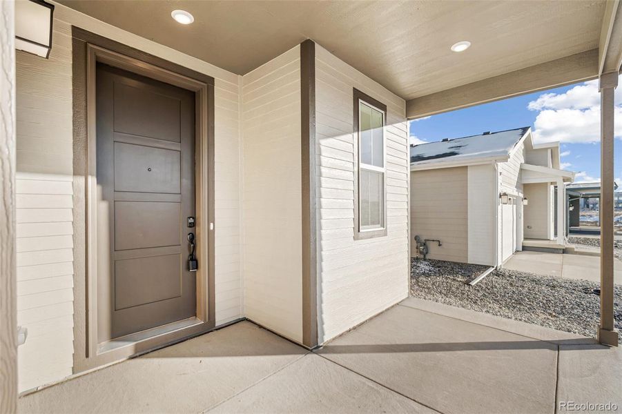 Exterior details and patio area of a home in The Nest Classic at Canyon Creek, Erie (Image 3).