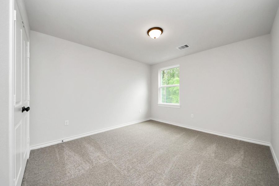 Spacious, unfurnished interior of a new home in The Enclave at Spring Branch, Montgomery (Image 35).