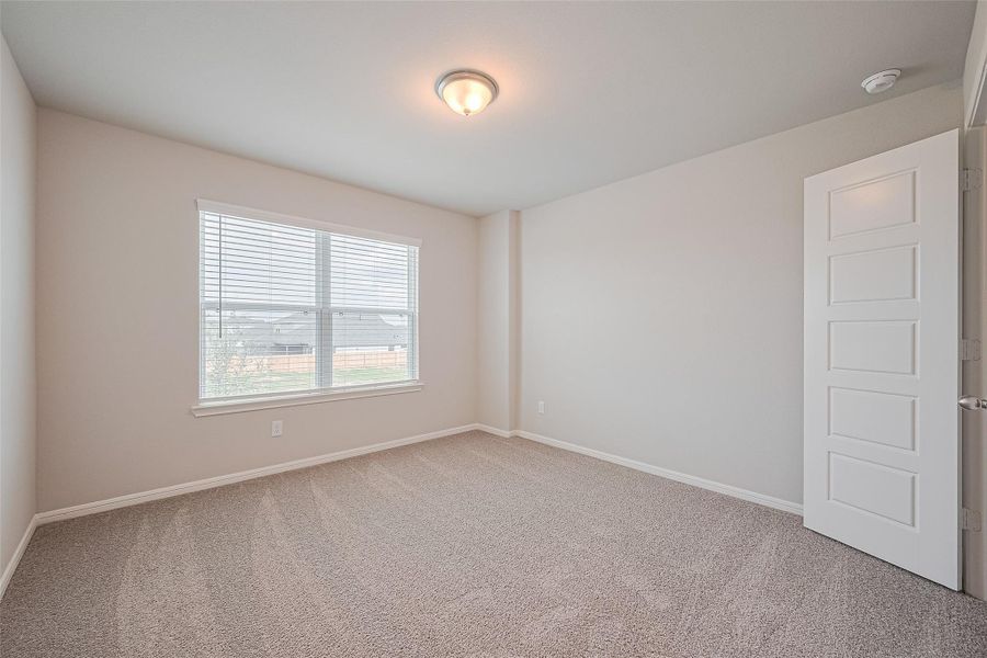 Spacious, unfurnished interior of a new home in Sunterra, Katy (Image 17).