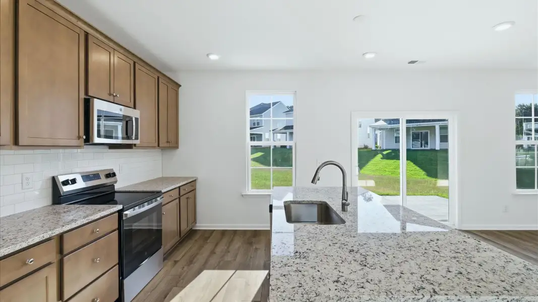 Furnished interior view inside a new home in Creekside at Andrews, Summerville (Image 8).