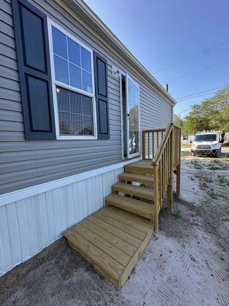 Exterior details and patio area of a home in , Brooksville (Image 16). Exterior details and patio area of a home in , Brooksville (Image 16).