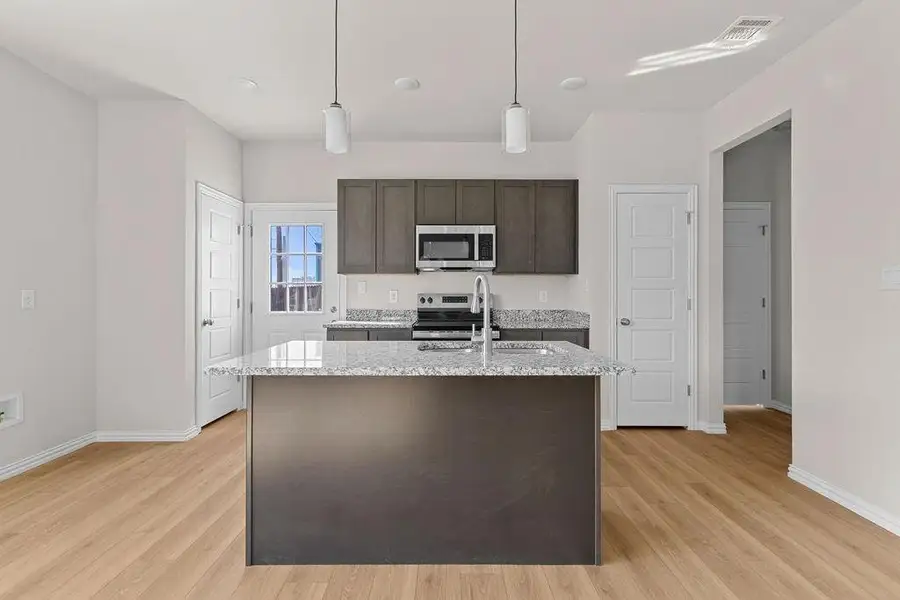 Furnished interior view inside a new home in , Fort Worth (Image 5).