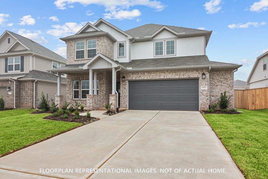 Front exterior of a new home in Magnolia Ridge, Magnolia, TX, highlighting curb appeal (Image 17).