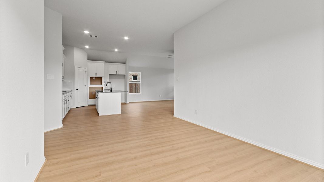 Representative furnished interior of a home built from the Aruba by Brightland Homes in Bridgeland Creekland Village, Cypress (Image 10).