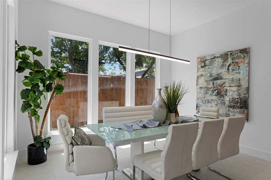 Dining room featuring light tile patterned floors