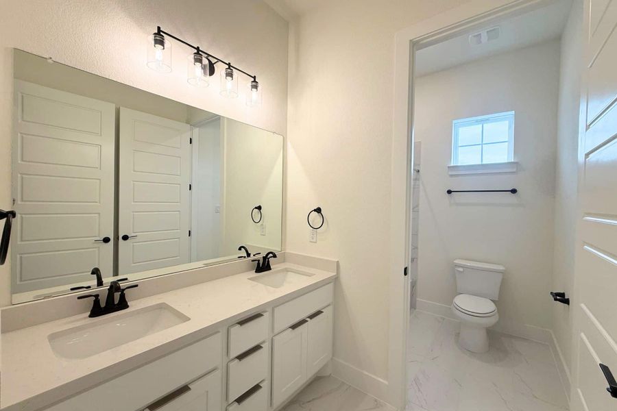 Furnished interior view inside a new home in Heights at San Gabriel, Georgetown (Image 11).