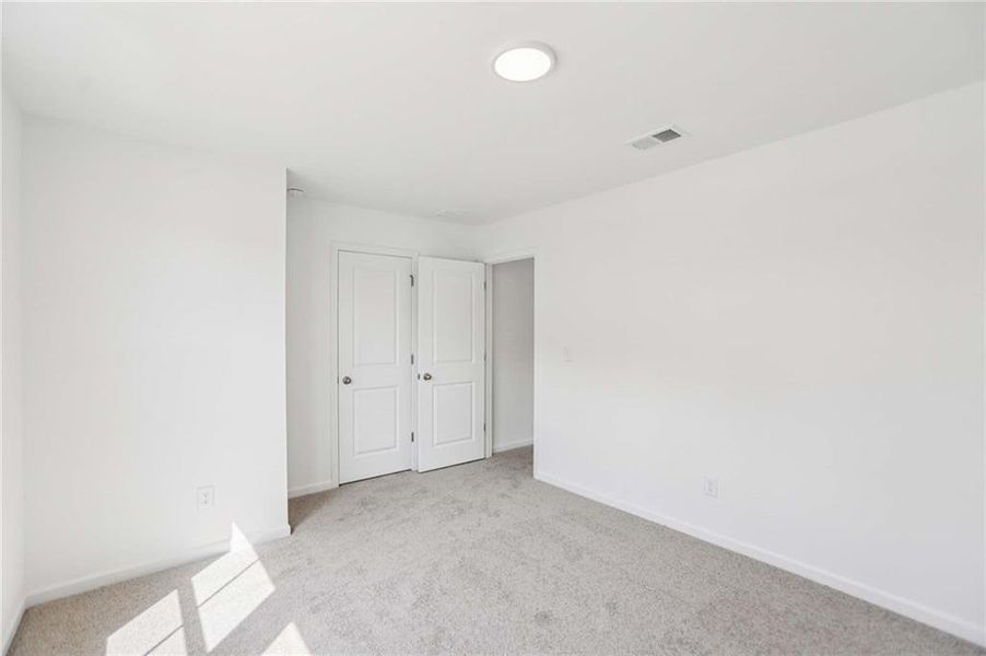 Spacious, unfurnished interior of a new home in The Pointe at Heron Bay, Locust Grove (Image 14).