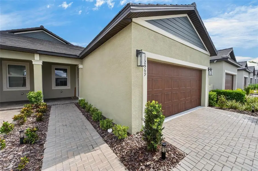 Exterior details and patio area of a home in , Parrish (Image 38).