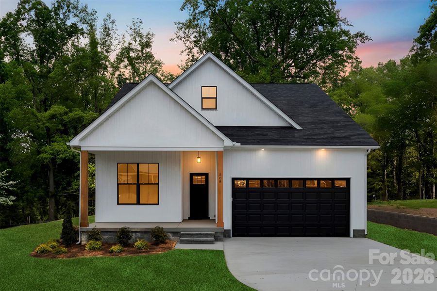 Front exterior of a new home in , Landis, NC, highlighting curb appeal (Image 22).
