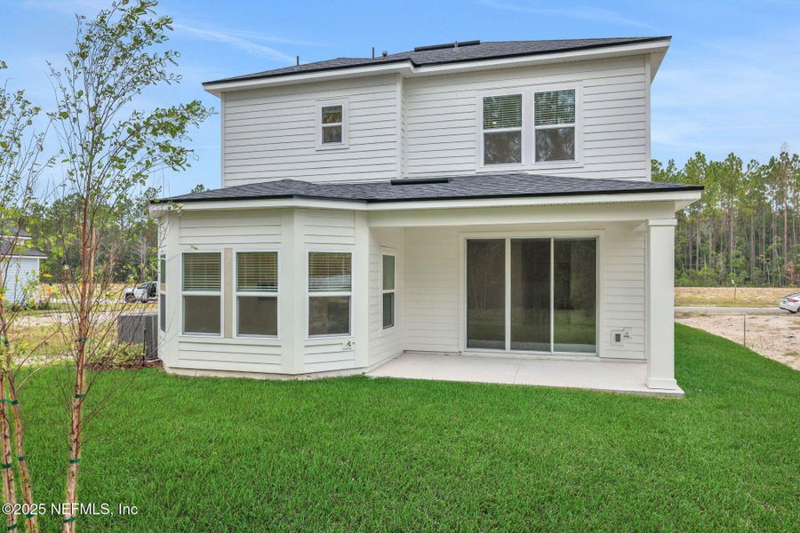 Exterior details and patio area of a home in Brook Forest - Single Family Homes, St. Augustine (Image 3). Exterior details and patio area of a home in Brook Forest - Single Family Homes, St. Augustine (Image 3).