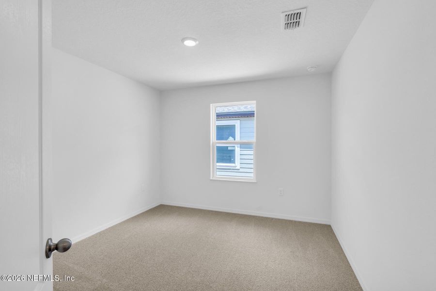 Spacious, unfurnished interior of a new home in Rolling Hills, Green Cove Springs (Image 19).