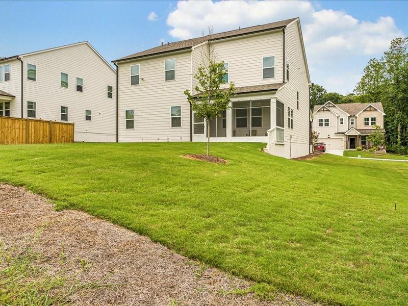 Front exterior of a new home in Pine Mountain Park, Kennesaw, GA, highlighting curb appeal (Image 21).