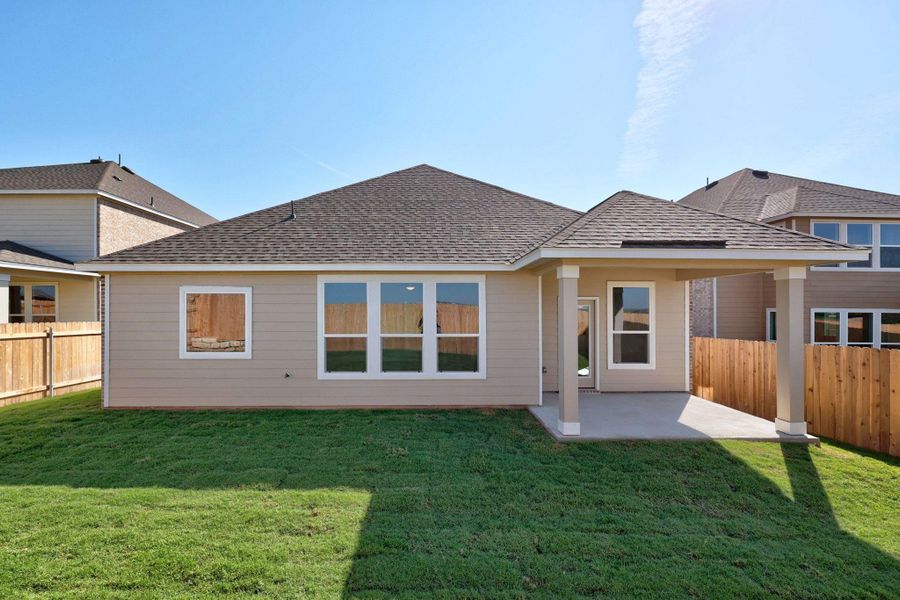 Front exterior of a new home in Salerno - Classic Collection, Round Rock, TX, highlighting curb appeal (Image 2). Front exterior of a new home in Salerno - Classic Collection, Round Rock, TX, highlighting curb appeal (Image 2).