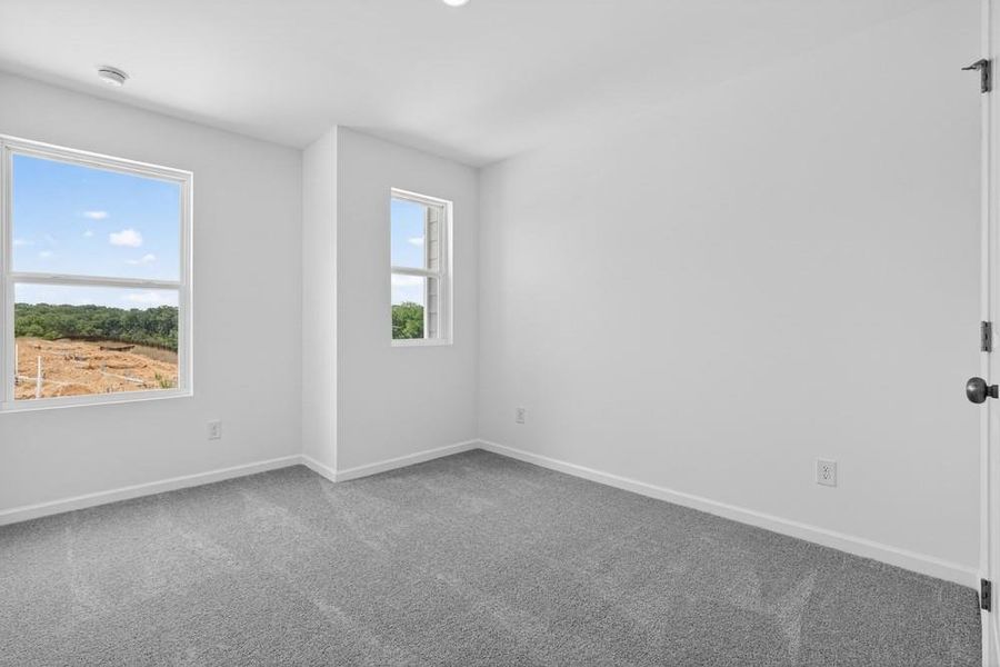 Spacious, unfurnished interior of a new home in Weatherfield, Buford (Image 28).