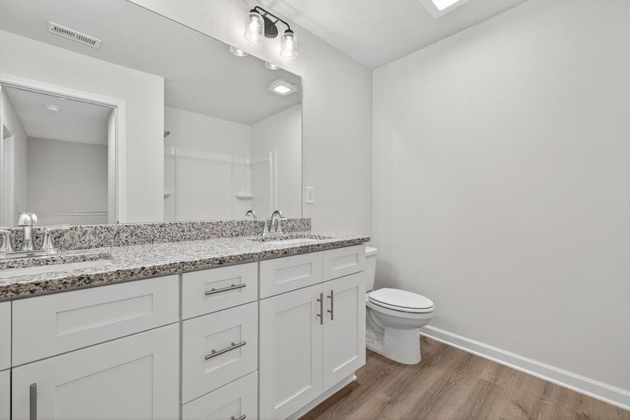 Furnished interior view inside a new home in Medlock Park, Austell (Image 5).