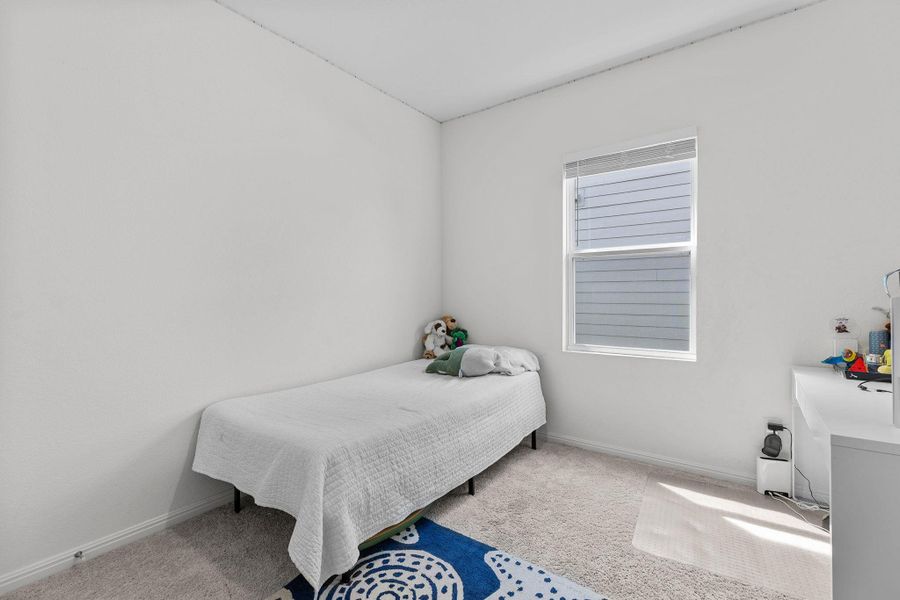 Bedroom with carpet floors Bedroom with carpet floors