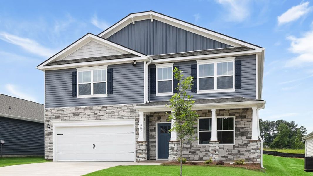 Front exterior of a new home in Woodglen, Piedmont, SC, highlighting curb appeal (Image 2). Front exterior of a new home in Woodglen, Piedmont, SC, highlighting curb appeal (Image 2).