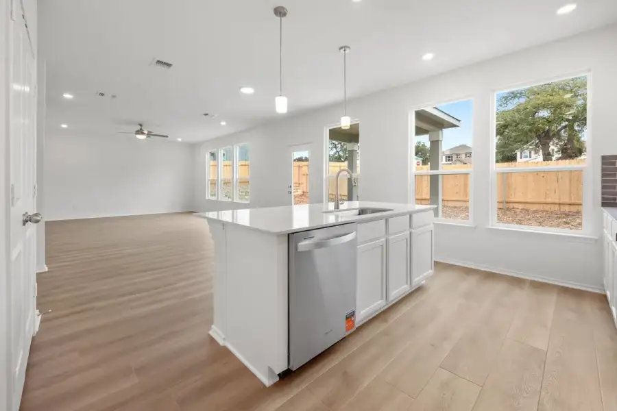 Furnished interior view inside a new home in River Bluff, Leander (Image 8).